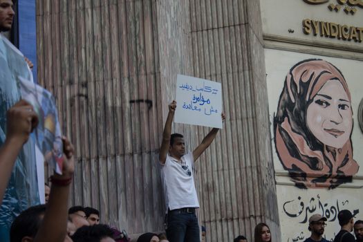 EGYPT, Cairo: Protesters gathered outside the Syndicate of Journalists building in Cairo, Egypt on October 18, 2015 in a show of support for Palestinians. The activists demonstrated against the recent attacks in Jerusalem, the West Bank and Gaza. They raised the flag of Palestine as some people stood on Israel's flag in anger.