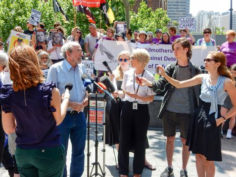 AUSTRALIA, Sydney: Supporters of a Somalian refugee, known as Abyan, have protested outside the Department of Immigration in Sydney on October 19, 2015 after she was taken back to Nauru last week. The woman, who was allegedly raped, was flown to Australia to have an abortion but was returned to Nauru by a chartered jet on Friday, without having had an abortion.  