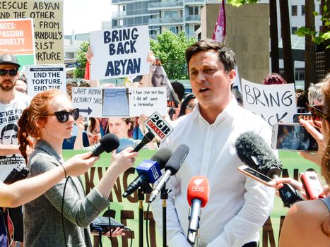 AUSTRALIA, Sydney: Supporters of a Somalian refugee, known as Abyan, have protested outside the Department of Immigration in Sydney on October 19, 2015 after she was taken back to Nauru last week. The woman, who was allegedly raped, was flown to Australia to have an abortion but was returned to Nauru by a chartered jet on Friday, without having had an abortion. Paul Oosting, from Get Up! is pictured.