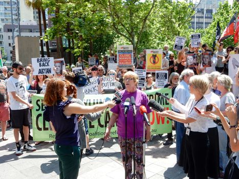 AUSTRALIA, Sydney: Supporters of a Somalian refugee, known as Abyan, have protested outside the Department of Immigration in Sydney on October 19, 2015 after she was taken back to Nauru last week. The woman, who was allegedly raped, was flown to Australia to have an abortion but was returned to Nauru by a chartered jet on Friday, without having had an abortion. Speaker from Grandmothers against Detention of Refugee Children.