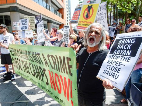 AUSTRALIA, Sydney: Supporters of a Somalian refugee, known as Abyan, have protested outside the Department of Immigration in Sydney on October 19, 2015 after she was taken back to Nauru last week. The woman, who was allegedly raped, was flown to Australia to have an abortion but was returned to Nauru by a chartered jet on Friday, without having had an abortion. 