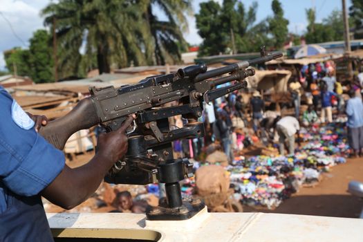 CENTRAL AFRICAN REPUBLIC, Bangui : Soldiers of the United Nations Multidimensional Stabilization Mission in Central African Republic, Minusca, passe on a street in Bangui, as they patrol in the city, on October 18, 2015. The Central African Republic descended into bloodshed more than two years ago after long time president Francois Bozize, a Christian, was ousted by Seleka rebels, triggering the worst crisis since independence in 1960. On September 29, 2015, Bangui returned to only relative calm after three days of inter-community violence which left at least 40 dead and 100 injured according to the UN Refugee Agency UNHCR. Some 27,000 inhabitants of Bangui have also fled to displaced people's camps
