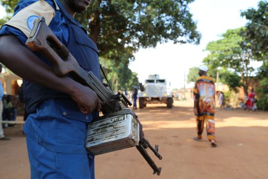 CENTRAL AFRICAN REPUBLIC, Bangui : Soldiers of the United Nations Multidimensional Stabilization Mission in Central African Republic, Minusca, passe on a street in Bangui, as they patrol in the city, on October 18, 2015. The Central African Republic descended into bloodshed more than two years ago after long time president Francois Bozize, a Christian, was ousted by Seleka rebels, triggering the worst crisis since independence in 1960. On September 29, 2015, Bangui returned to only relative calm after three days of inter-community violence which left at least 40 dead and 100 injured according to the UN Refugee Agency UNHCR. Some 27,000 inhabitants of Bangui have also fled to displaced people's camps