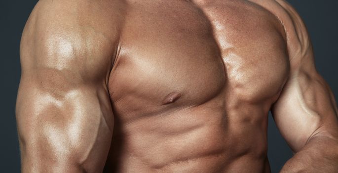 Body of muscular man. Horizontal studio shot