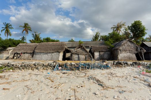 poor huts of the natives, traditional indonesian poor house - shack on beach, Nusa Penida Island, Toyapakeh. Bali.