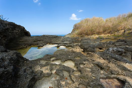 dream coastline at Bali, near Manta Point famous Diving place, Nusa Penida with blue sky
