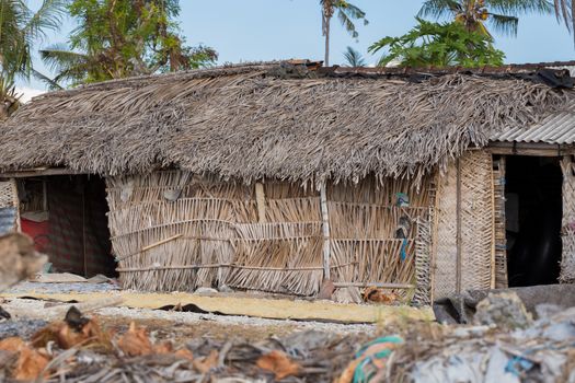 poor huts of the natives, traditional indonesian poor house - shack on beach, Nusa Penida Island, Toyapakeh. Bali.