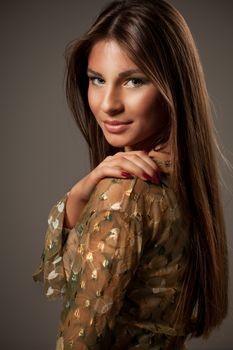 Beauty portrait of a young, beautiful caucasian woman. Looking at camera.