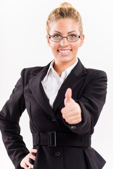Portrait of attractive businesswoman showing thumbs up. Looking at camera.