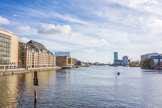 Berlin, Germany - October 29, 2013: View of river Spree from bridge Oberbaumbruecke towards Treptower Park.