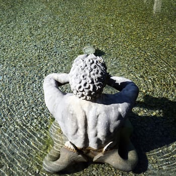 Sculpture in the water in Hellbrunn palace garden in Salzburg, Austria
