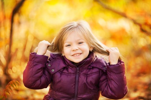 Cute Little girl having fun in the park