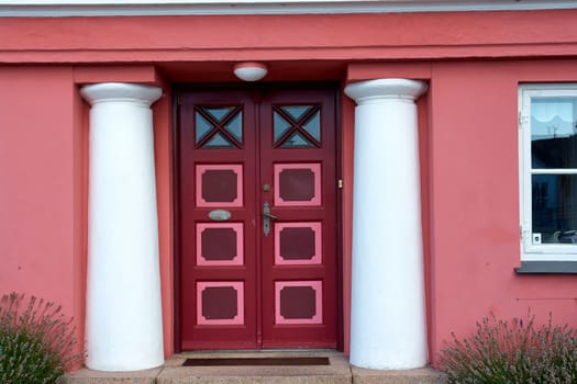 Bright vivid beautiful colors traditional classical painted front wooden door                                               