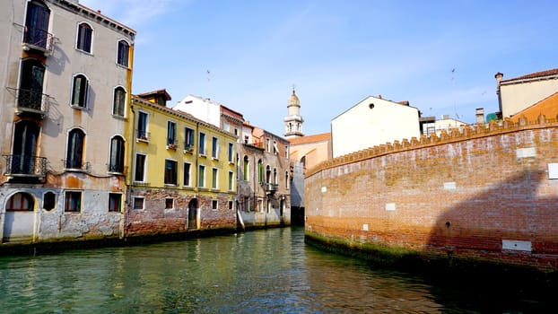 canal and ancient buildings in Venice, Italy