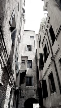 old building with brick material in old town city Venice, Italy greyscale