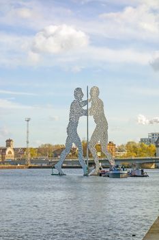 Berlin, Germany - October 29, 2013: Molecule Man sculpture by Jonathan Borofsky. The sculpture represent the intersection of the districts Treptow, Kreuzberg and Friedrichshain.