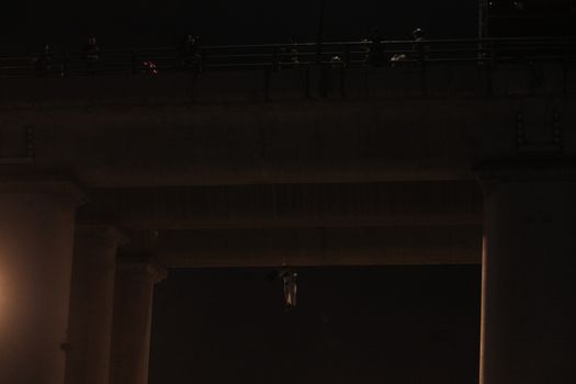 [Warning: graphic content]MEXICO, Iztapalapa: A dead man hangs from the Puente La Concordia, a bridge in Iztapalapa, Federal District, Mexico City, Mexico on October 19, 2015. The victim, reportedly close to age 30, was found with his head and body wrapped, and showed signs of torture when he was discovered around 4am local time. While the man's death is still being investigated, Iztapalapa has been listed among the most dangerous neighborhoods in the world.