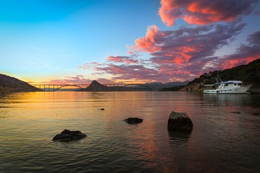 Krk bridge at dusk with colorful sky, Croatia