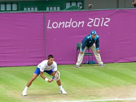 WIMBLEDON, ENGLAND - August 2nd, 2012 - Novak Djokovic during one of his singles matches at the summer Olympics in London in 2012. He took 4th place in the tournament.