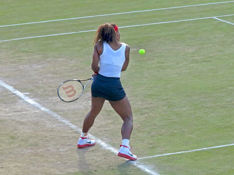 WIMBLEDON, ENGLAND - August 2nd, 2012 � Serena Williams during one of her doubles matches at the summer Olympics in London in 2012. Serena and Venus Williams went on to win the women�s doubles and take home the gold medal.