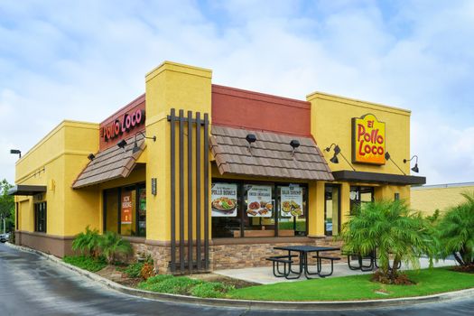 COSTA MESA, CA/USA - OCTOBER 17, 2015: El Pollo Loco restaurant exterior and sign. El Pollo Loco is a restaurant chain based in the United States.