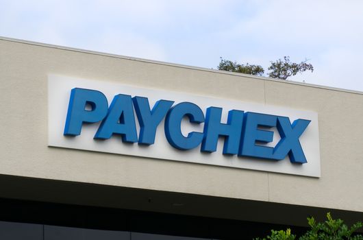 COSTA MESA, CA/USA - OCTOBER 17, 2015: Paychex corporate building. Paychex, Inc. is a provider of payroll, human resource, and benefits outsourcing solutions.