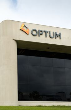 COSTA MESA, CA/USA - OCTOBER 17, 2015: Optum corporation headquarters and logo. Optum is a division of United Healthcare, Inc.