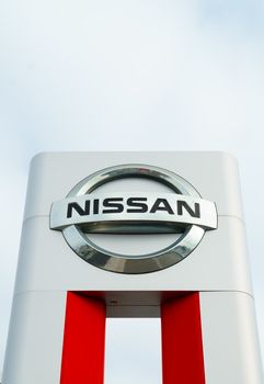 COSTA MESA, CA/USA - OCTOBER 17, 2015: Nissan Motors automobile dealership and sign.  Nissan Motors is is a Japanese multinational automotive manufacturer headquartered in Japan.