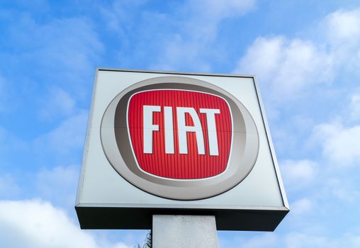 COSTA MESA, CA/USA - OCTOBER 17, 2015: Fiat automobile dealership sign. Fiat is an Italian manufacturer of automobiles and commerical vehicles.