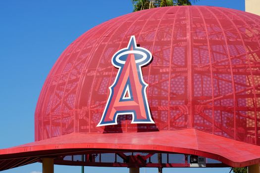 ANAHEIM, CA/USA - OCTOBER 10, 2015: Iconic oversized Angels baseball cap at the entrance to Angel Stadium, home of  Major League Baseball's Los Angeles Angels.