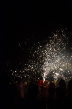 Barcelona, Spain- September 20, 2015: Fire Run or Correfoc, La Merce, Groups dress as devils and parade down the streets letting off fireworks.
