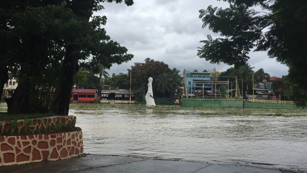 PHILIPPINES, Marikina: Marikina river overflows on October 18, 2015 in Marikina, in Philippines. Heavy rain deepened flood misery in farming and mountainous regions of the northern Philippines October 20, after the latest typhoon to hit the storm-ravaged nation killed at least 22 people.     