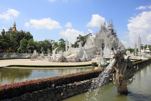 Wat Rong Khun temple is located in the city of Chiang Rai