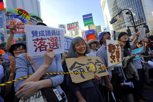 JAPAN, Tokyo : Thousands of people protest in Tokyo outside of Japan's parliament against new legislation that would allow the military to deploy overseas on October 19, 2015. The changes would allow Japanese troops to fight abroad for the first time since World War Two.