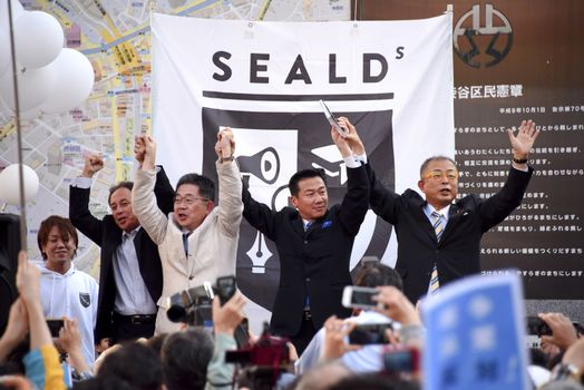 JAPAN, Tokyo : Thousands of people protest in Tokyo outside of Japan's parliament against new legislation that would allow the military to deploy overseas on October 19, 2015. The changes would allow Japanese troops to fight abroad for the first time since World War Two.