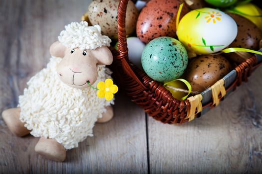 Easter decoration with eggs and cute lamb and bunny