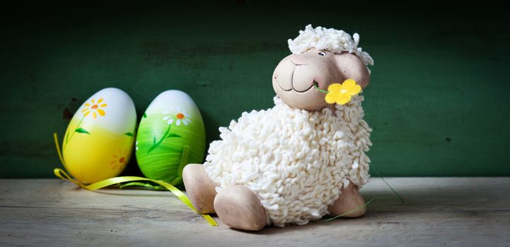 Easter decoration with eggs and cute lamb and bunny