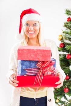 Beautiful happy christmas girl with christmas presents.