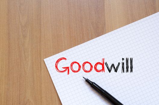 Goodwill text concept write on notebook
