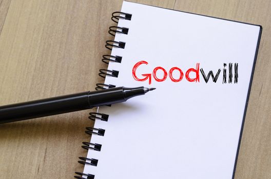 Goodwill text concept write on notebook