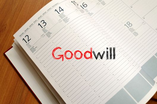 Goodwill text concept write on notebook