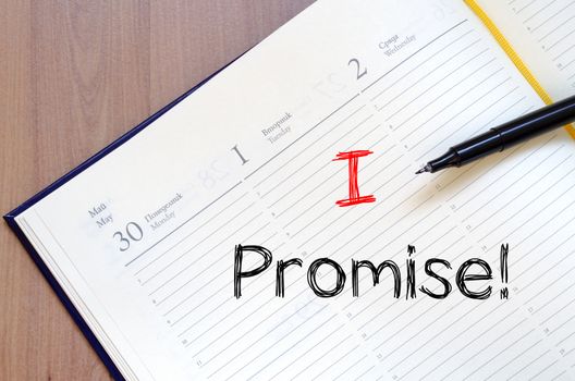 I promise text concept write on notebook