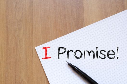 I promise text concept write on notebook