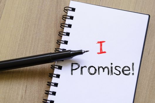 I promise text concept write on notebook