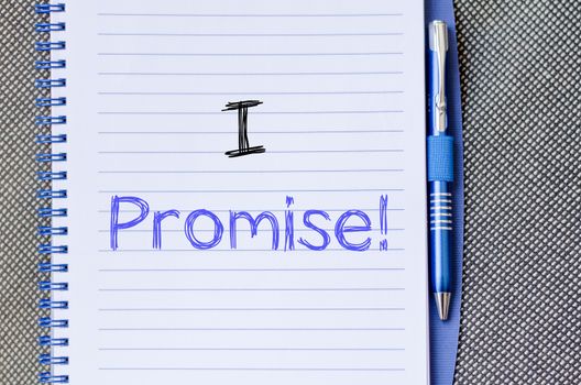 I promise text concept write on notebook