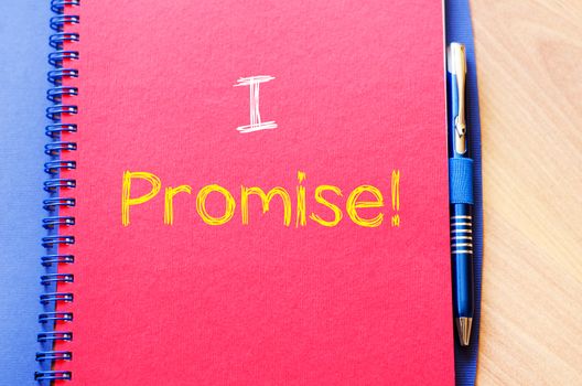 I promise text concept write on notebook