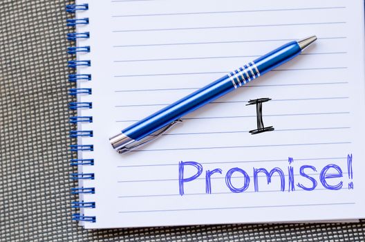I promise text concept write on notebook