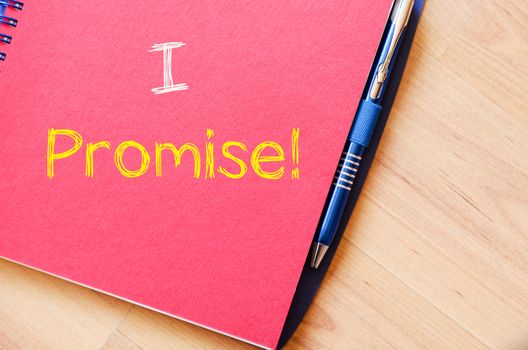 I promise text concept write on notebook