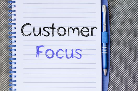 Customer focus text concept write on notebook
