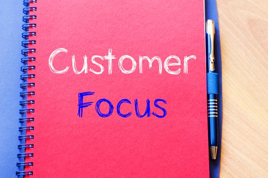 Customer focus text concept write on notebook